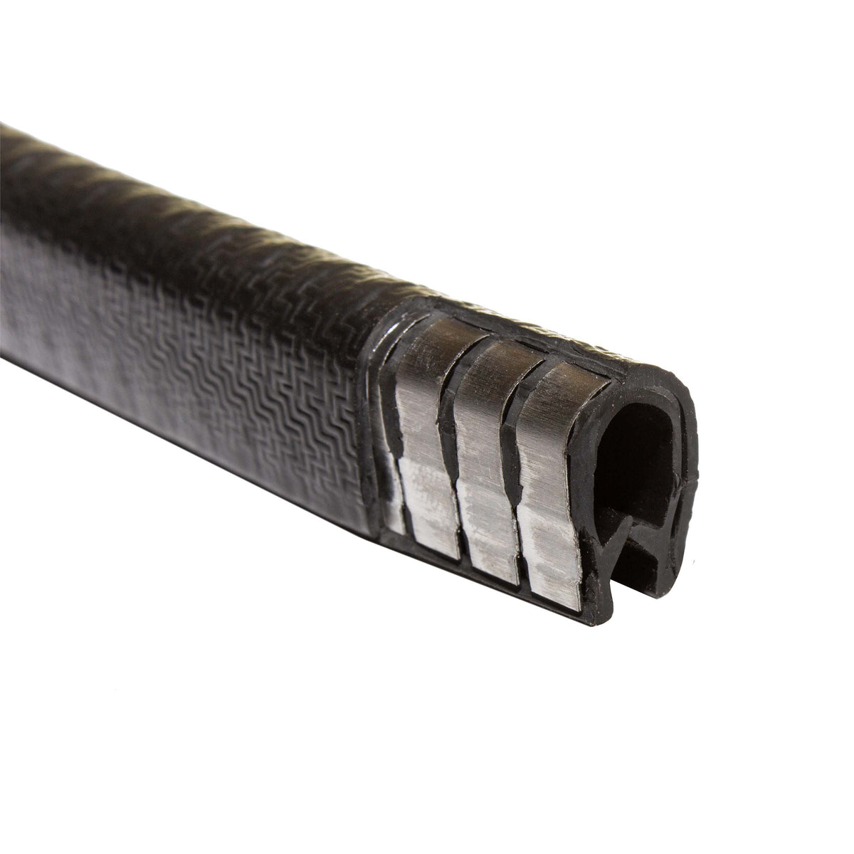 Cut end of the Edge Guard showing the metal clips inside