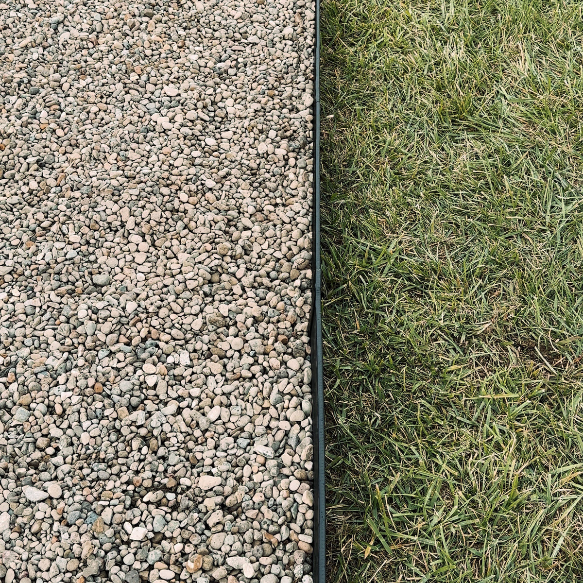 Edge Guard on Grass Barrier between gravel and lawn