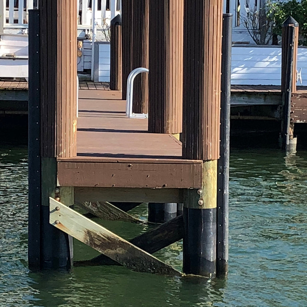 Front view of installed HDPE dock-piling wrap