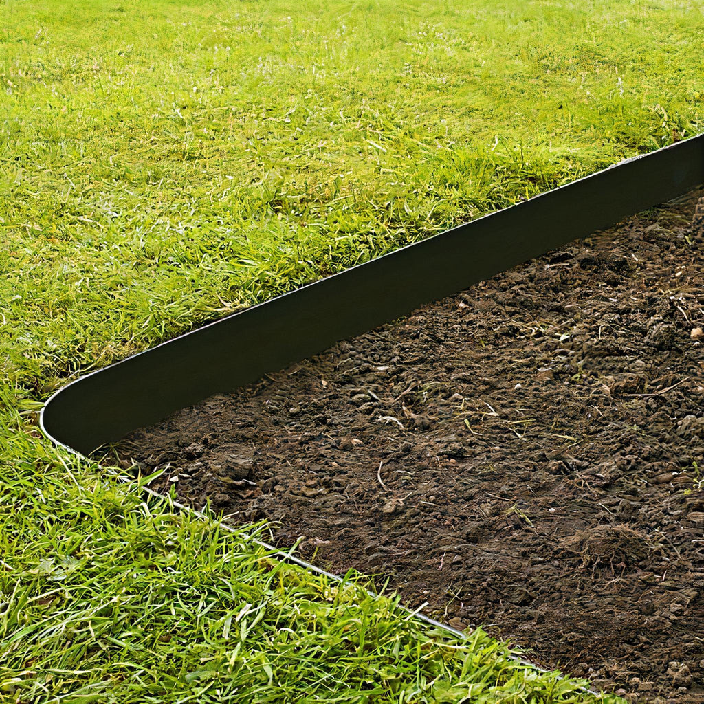 Grass Barrier set between a lawn and a soil bed